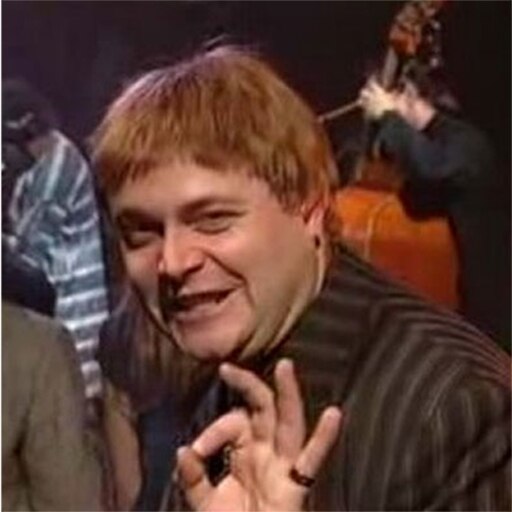 An image of Louis Balfour making the 'nice' gesture